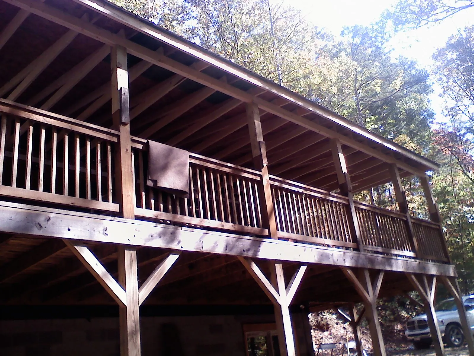 Timber framing under a new elevated porch and deck — Roof Leak Repair in Granite Canon by Roofing Brothers